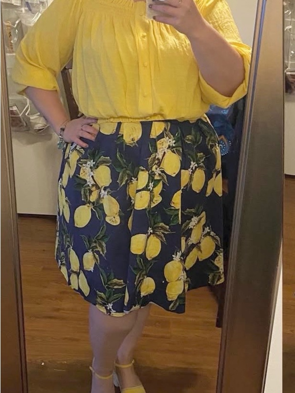 2x Lemon A line skirt, navy background